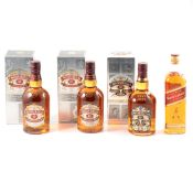 Three bottles of Chivas Regal, 12 year old, and Johnnie Walker Red