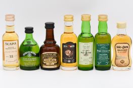 Twelve assorted single Islay and Lowland malt whiskies, mostly 1980s/90s bottlings