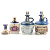 Two Lamb's Navy Rum stoneware flagon, and two other flasks