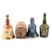 Collection of EMPTY Dimple and VAT 69 bottles, and Bells decanters