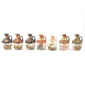 Thirteen assorted Rutherford's ceramic decanters, blended 12 year old whisky