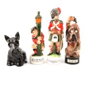 Three novelty ceramic musical whisky decanters, and a Scotty dog ceramic decanter
