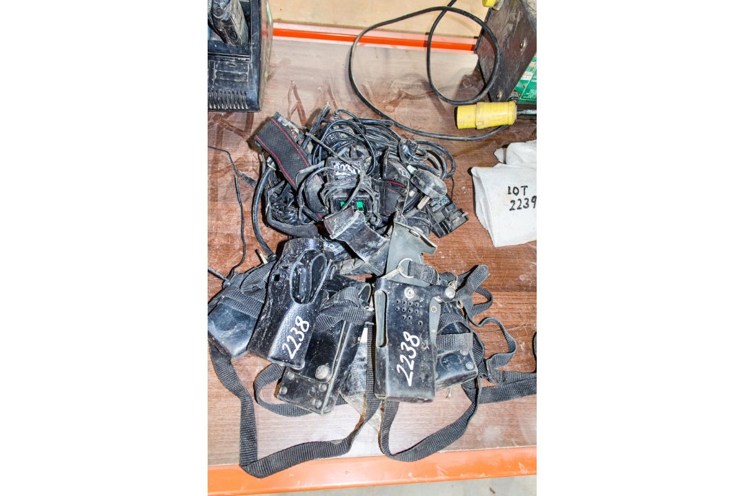 Quantity of various chargers and radio cases CW