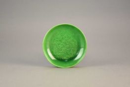 A Chinese Langyao type green glazed dragon dish