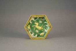 A Chinese gilt-metal mounted biscuit famille verte dish, Kangxi