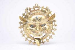 A Tibetan brass Yama mask