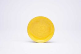 A Chinese yellow-glazed dragon dish, Qing Dynasty