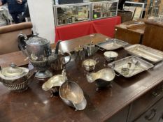 Platedware: Silver plate tableware to include teapot, coffee pot, serving dishes and gravy boats.