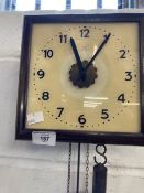 Clocks: Early 20th cent. Wall clock with glass face and Arabic numerals.