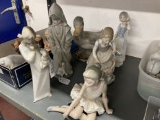 20th cent. Ceramics: Nao boy in raincoat with dog, Lladro girl with cat No. 1187 G, girl with broom,