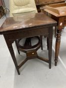 19th cent. Mahogany envelope games table with decorated frieze and legs. 22ins.