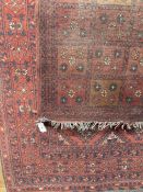 Carpets & Rugs: 20th cent. Turkman woolen carpet, red ground, six borders, geometric stylised