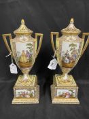 19th/20th cent. Vienna porcelain urns each of baluster handled form decorated with romantic