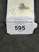 Jewellery: Yellow metal ring set with a star sapphire, estimated weight 1.50ct, tests as 18ct