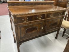 1920s mahogany sideboard two drawers above two cupboards decorated in the Jacobean style with