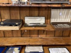 20th cent. Mappin & Webb six place setting fish knives and forks enclosed in a satin lined case.
