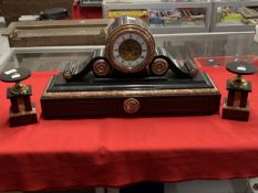 Clocks: 19th cent. French black and rose marble clock garniture with anchor escapement, strikes half