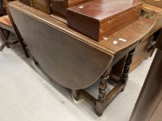 18th cent. Large oak gate-leg dining table with turned baluster supports, square moulded