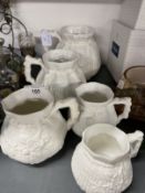 Late 19th/Early 20th cent. Ceramics: Five white porcelain graduated cider jugs, unsigned but with