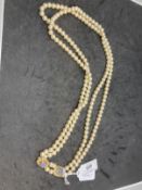 Necklet double row of 7.5mm cultured pearls (99) in each row with two 9ct spacers each set with an