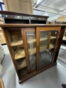 19th cent. Mahogany two door cabinet, moulded cornice above two glazed sliding doors with three