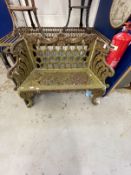 20th cent. Wrought iron garden bench honeycomb shaped back, scrolled arms and legs. Depth 18ins.