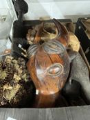 Tribal Art: Mixed lot to include a buffalo head mask, treen bell, carved bird shaped box, carved