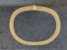 18ct yellow gold fancy link necklet. Weight 54.8g.