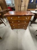 19th cent. Continental pine four drawer chest, shaped top with porcelain handles on bracket feet.