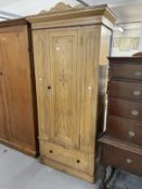 Early 20th cent. Art Nouveau pine wardrobe with single drawer below and stencilled decoration with