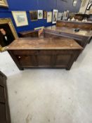 18th cent. Elm coffer peg jointed, panelled carving to the apron and panel mounts on the front and