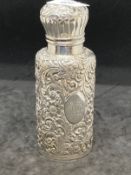 Hallmarked Silver: Cologne bottle, Birmingham 1890 with elaborate repoussage case, hinged lid, the
