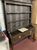 18th cent. Stained oak peg jointed dresser, open rack with later additions. Two drawer table unit on