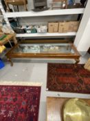 20th cent. Mahogany extremely large coffee table, the bevelled glass top with mahogany surround on