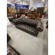 20th cent. Leather Chesterfield and matching pair of armchairs on bun feet. Settee length 80ins. - Image 2 of 3