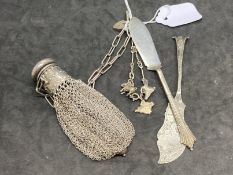 Jewellery: White metal bracelet with four charms attached, tests as silver, and two silver butter