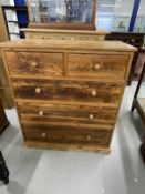20th cent. Pitch pine two over three chest of drawers on plinth support. 44ins. x 19ins. x 49ins.