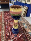 Pottery: Watcombe ware jardiniere and stand decorated with a coastal seascape with sailing boats.