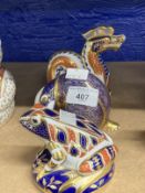 Royal Crown Derby paperweights, frog, badger, with stoppers and dragon, stopper missing, all