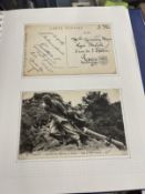 Postcards & Stamps: Four albums containing World covers and cards with a military theme.