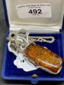 Jewellery: White metal 24ins. zip link chain with a 1¾ins. x 1ins. rectangular pendant attached