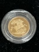 Coins: Gold proof Half Sovereign 1999.