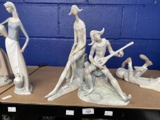 20th cent. Ceramics: Lladro Sad Harlequin figure 4558, 14½ins. Seated Harlequin figure playing a