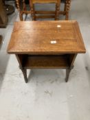 Oak arts and crafts revolving table in style of Heals. 21ins. x 14ins. x 22ins.