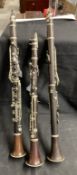 Musical Instruments: Woodwind, three late 19th/early 20th cent. Class C rosewood and nickel