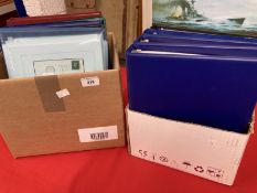 Postcards & Stamps: Four albums containing World covers and cards with a military theme. Plus four