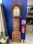 Clocks: 19th cent. 8 day oak arch dial longcase clock Beal of Rundle.
