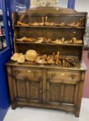 20th cent. Oak dresser and rack, the top with two shelves, the base with two drawers above two doors