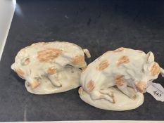 19th/20th cent. Derby style models of the Florentine Boars each raised on a rocky base with pale