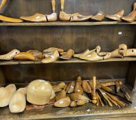 Treen: Cobblers shoe lasts, glove stretchers and a hat block. Approx. 40 items.